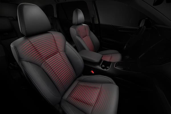 Illustration som visar aktiva värmeslingor i förar- och passagerarsäten i en Subaru.