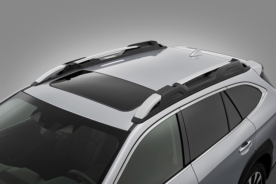 Takrails med integrerat, utfällbart takräcke på Subaru Outback.