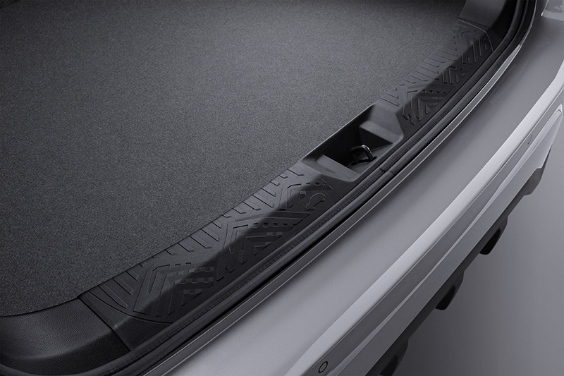 Närbild på lastskyddet vid bagageutrymmets kant i Subaru Crosstrek.